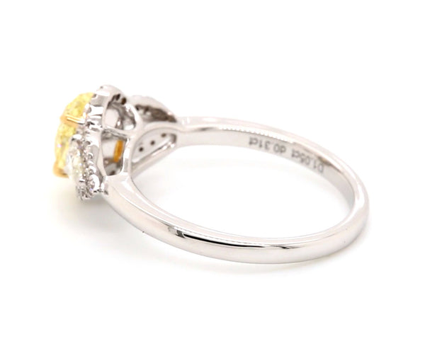 Fancy Light Oval Cut Yellow Diamond Engagement Ring